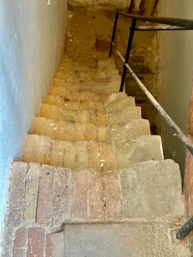 The very worn personnel stairs, disappearing into the basement - Sorø Academy