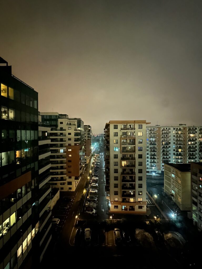 The view from our hotel, has rows and rows of yellow apartment blocks. Bucharest, Romania.